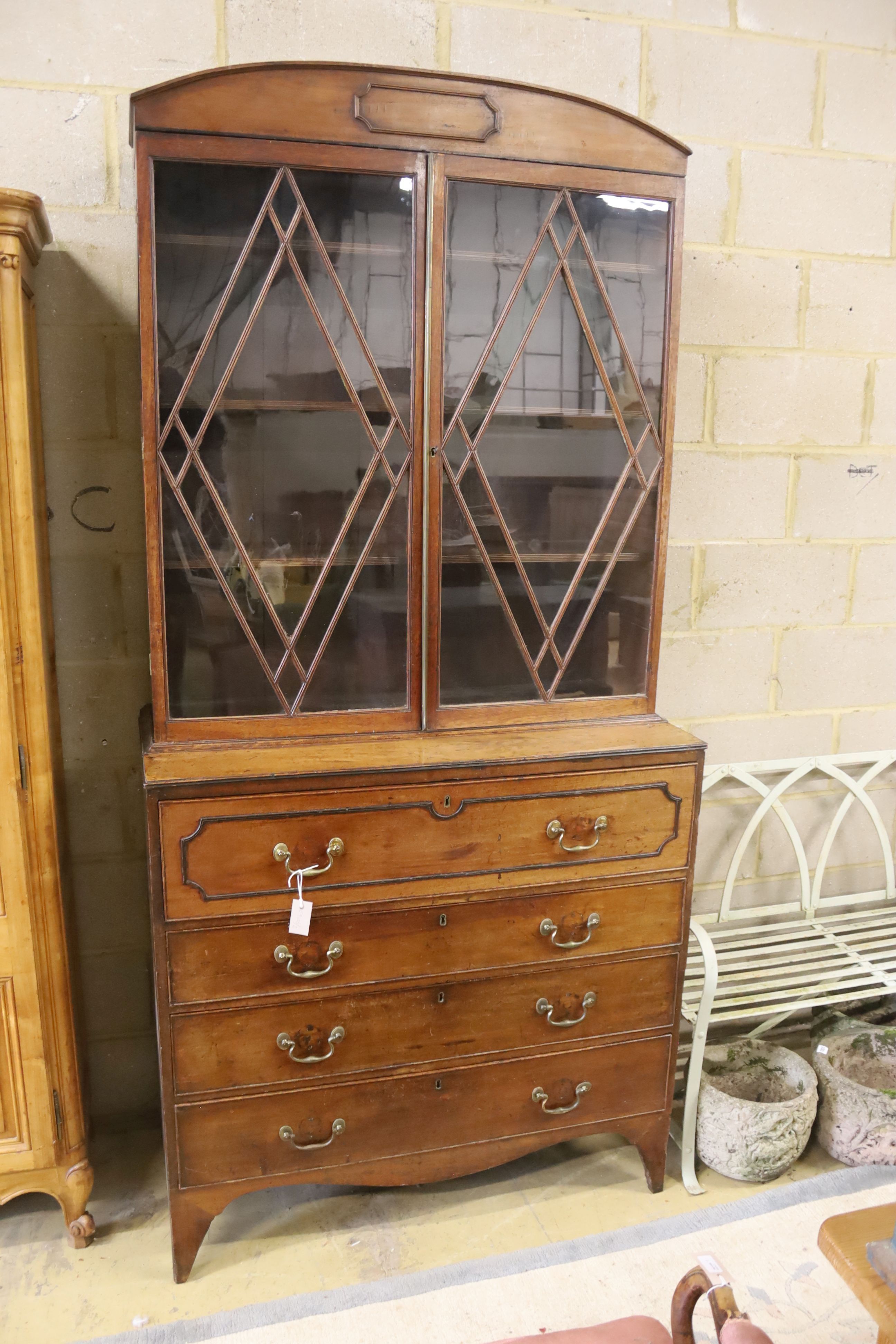 A Regency mahogany secretaire bookcase, length 107cm, depth 49cm, height 227cm